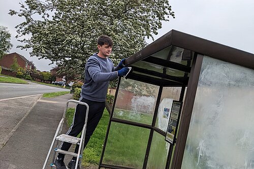 Aiden Cleaning bus shelter